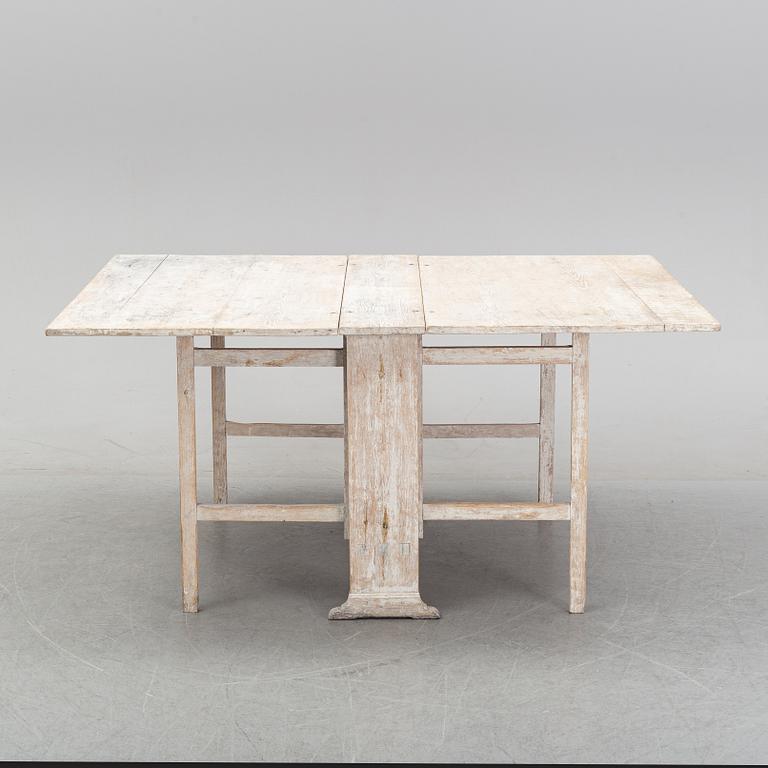 A painted gustavian gate-leg table, around the year 1800.