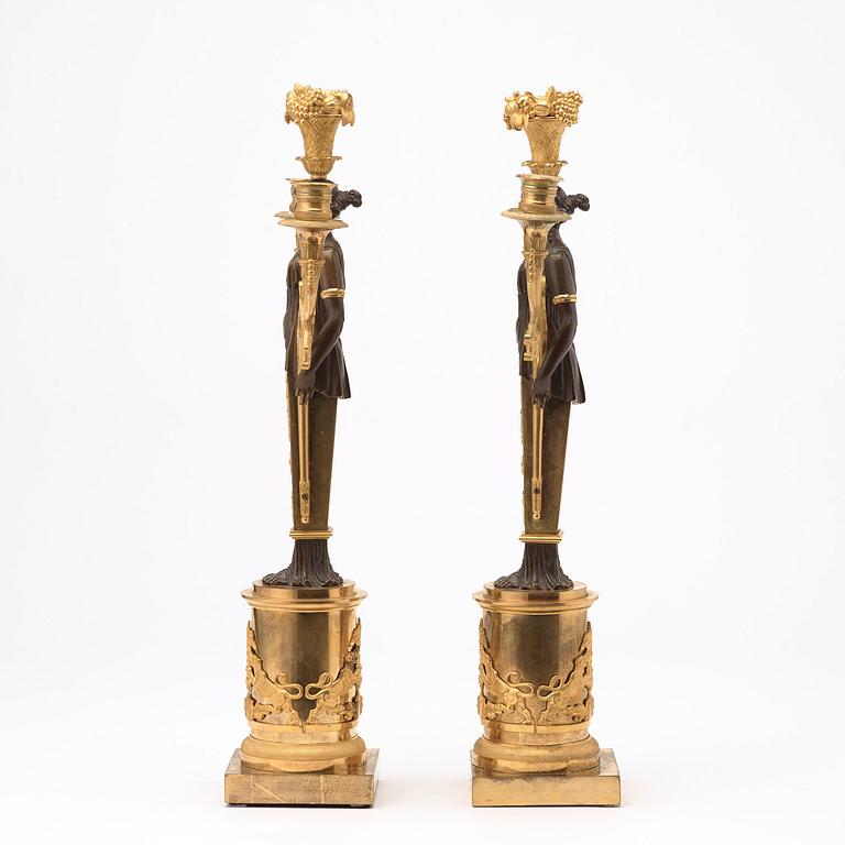 A pair of Swedish Empire early 19th century three-light candelabra.