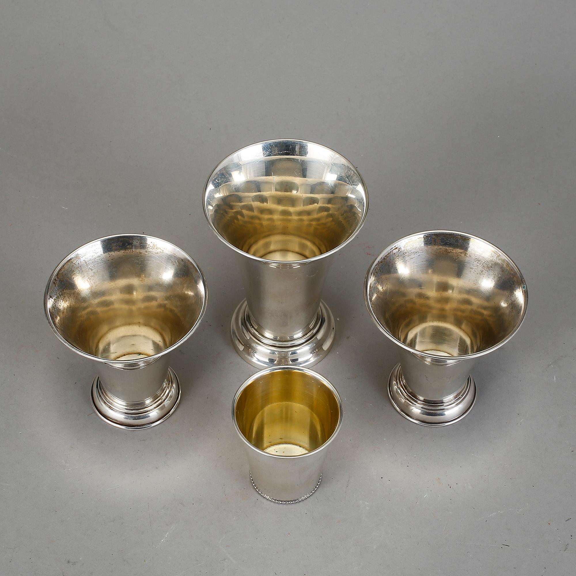 BÄGARE 4 st, silver. Bla Walléns guld och silversmide, Stockholm, 1954. Total vikt ca 329 g.