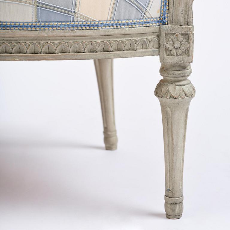 A pair of late Gustavian open armchairs by J. E. Höglander (master in Stockholm 1777-1813).