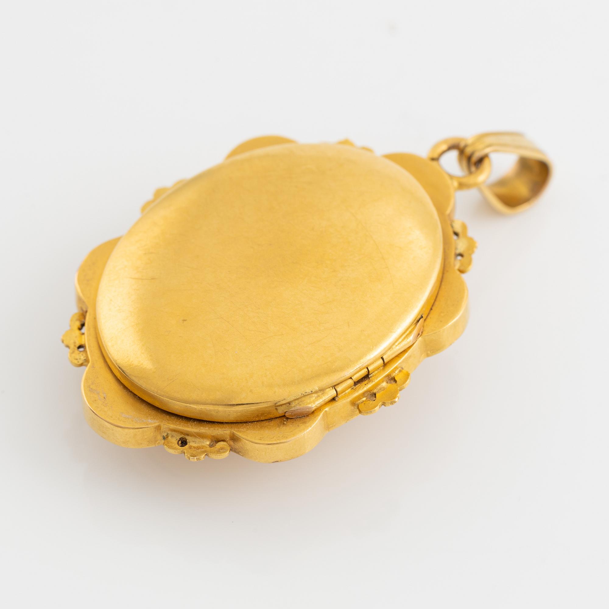 Locket with butterfly, with seed pearls, rubies and sapphires, 1800's.