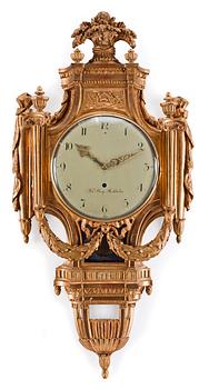 624. A Gustavian gilt wood wall clock by N. Berg.