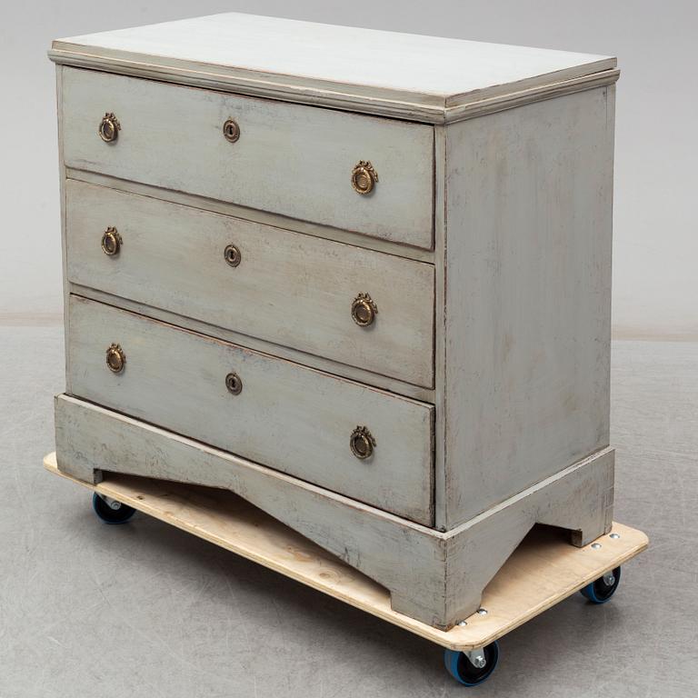 A mid 19th century painted chest of drawers.