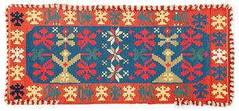 A double-interlocked tapestry carrige cushion, ”Stiliserade Ekar” c 114 x 49 cm, the first quater of the 19th century.