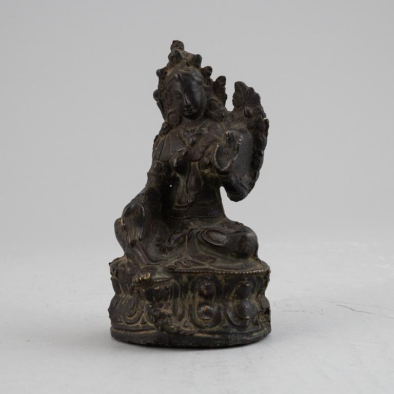 A Sino-Tibetan bronze figure of Green Tara, presumably 18th century.