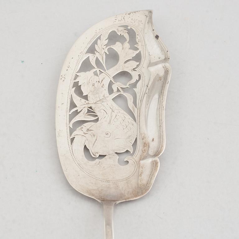 A Set of Silver Spoons and a Server, 18th-20th Century (5 pieces).