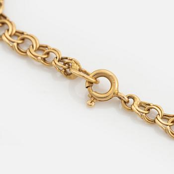 Armlänk, 18K guld, doserad bismarcklänk.