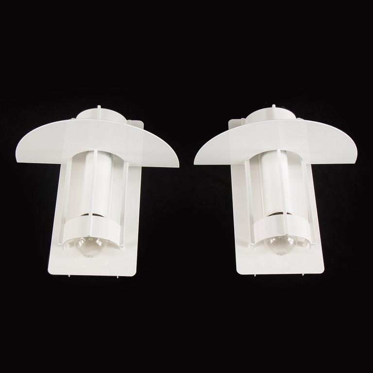 A set of two wall lamps by Joachim Lepper for Louis Poulsen, Danmark.