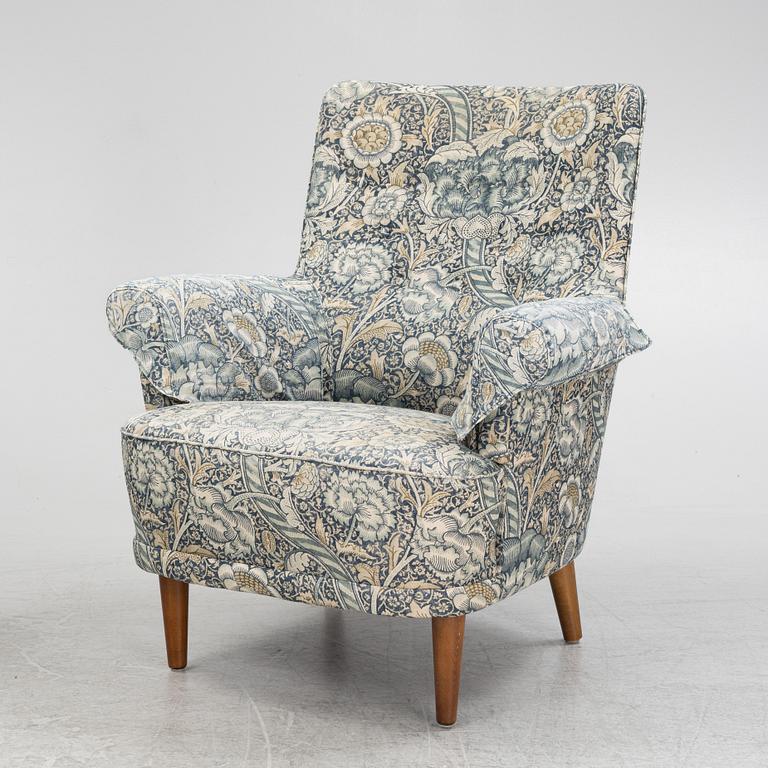Carl Malmsten, a pair of Hemmakväll easy chairs .