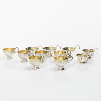 A set of eleven silver punch mugs, including with mark of Nya Guldsmedsaffären Göte Persson, Vilhelmina 1951.