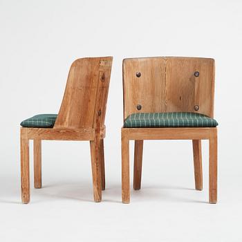 Axel Einar Hjorth, a pair of "Lovö" stained pine chairs, Nordiska Kompaniet, 1930s.