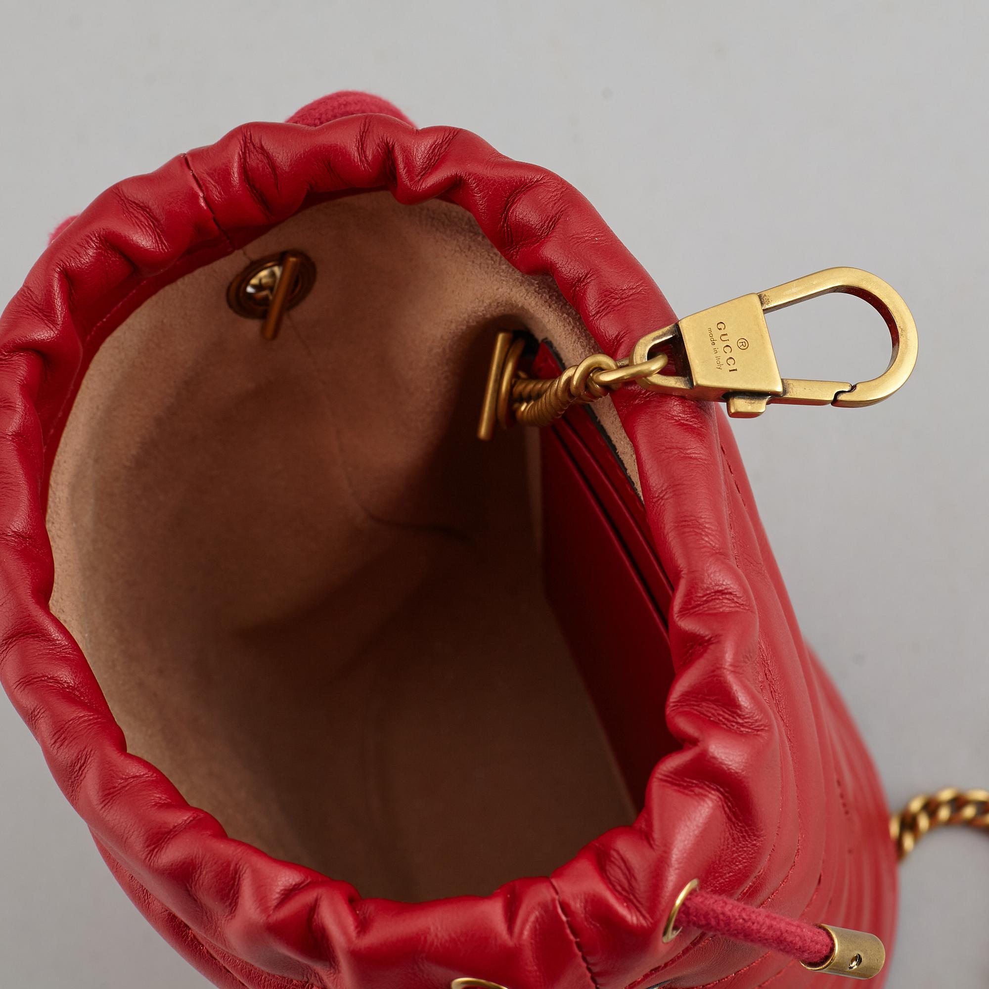 GUCCI, 'Marmont leather bucket bag'.