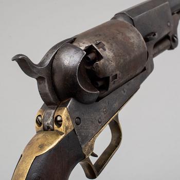 A Colt Dragoon percussion revolver no 9344 manufactured 1850.