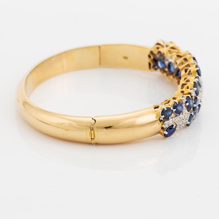 Sapphire and brilliant cut diamond bangle.