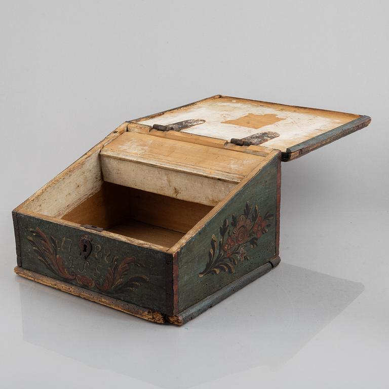 A Swedish polychrome-painted writing box, dated 1788.