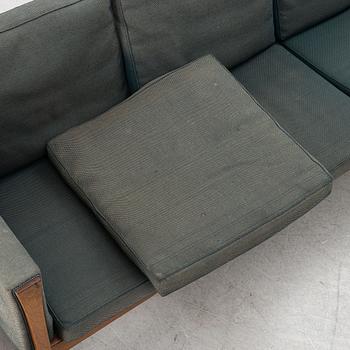 Hans J. Wegner, a model AP62/4 sofa and model AP62/1 armchiar,