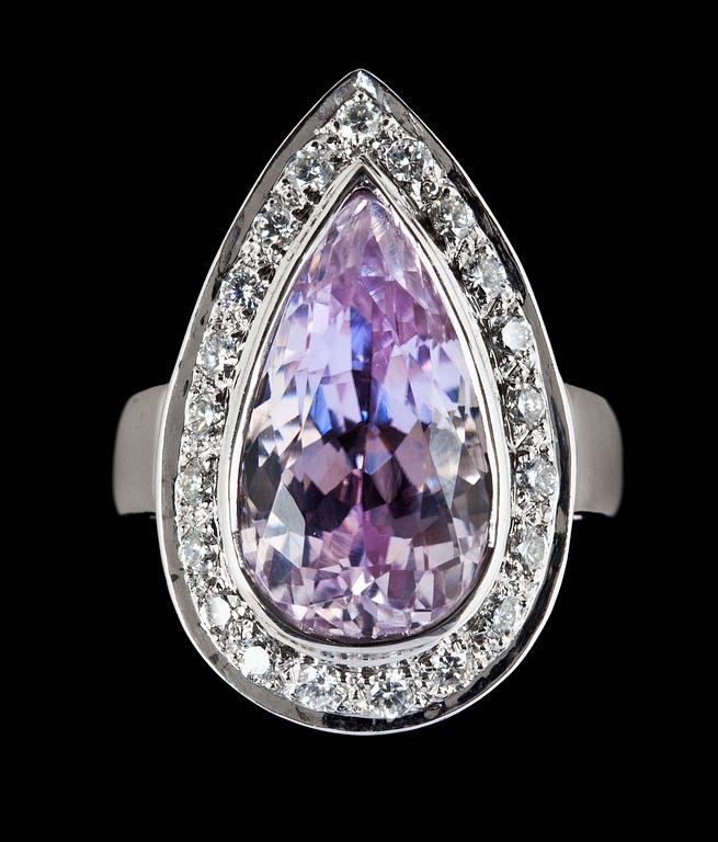 A drop shaped kunzite and diamond ring.