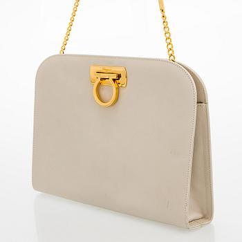 Salvatore Ferragamo, a leather “Gancini”bag.