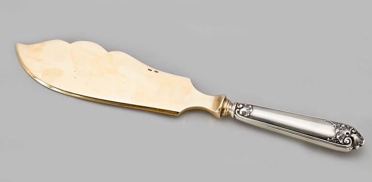 A RUSSIAN PARCEL-GILT SERVING KNIFE, Makers mark of Alexander Lubavin, St. Petersburg 19th/20th century.