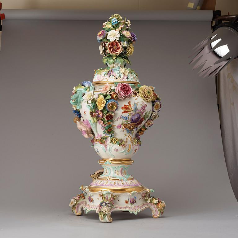 A large Meissen porcelain flower-encrusted pot-pourri vase, cover and stand, late 19th century.