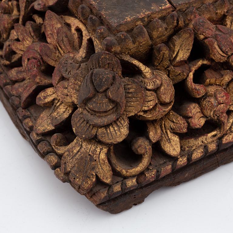 A set of three carved wooden stands, early 20th Century.