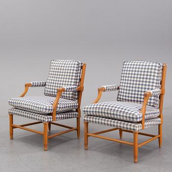 An end of the 20th Century pair of Gustavian style oak armchairs.