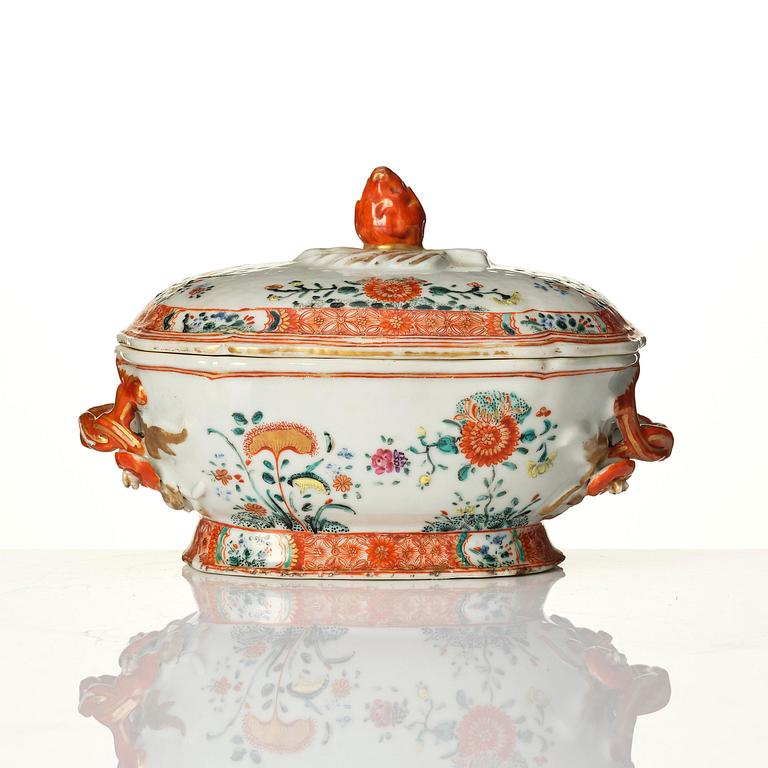 A famille rose butter tureen with cover and stand, Qing dynasty, 18th century.