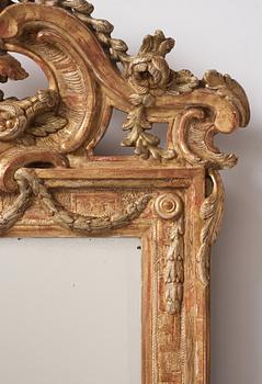 A Gustavian carved giltwood mirror, 1770's.