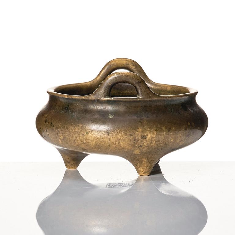 A tripod bronze censer, 17/18th Century with Xuande mark.