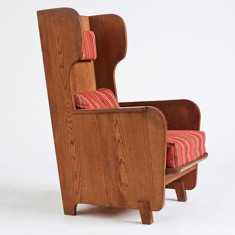 Axel Einar Hjorth, a stained pine "Lovö" armchair, Nordiska Kompaniet, Sweden 1930s.