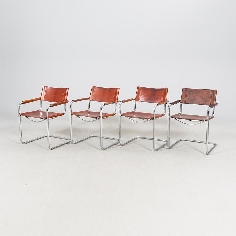 A matched set of four Matteo Grassi chrome and leather armchairs, late 20th Century.