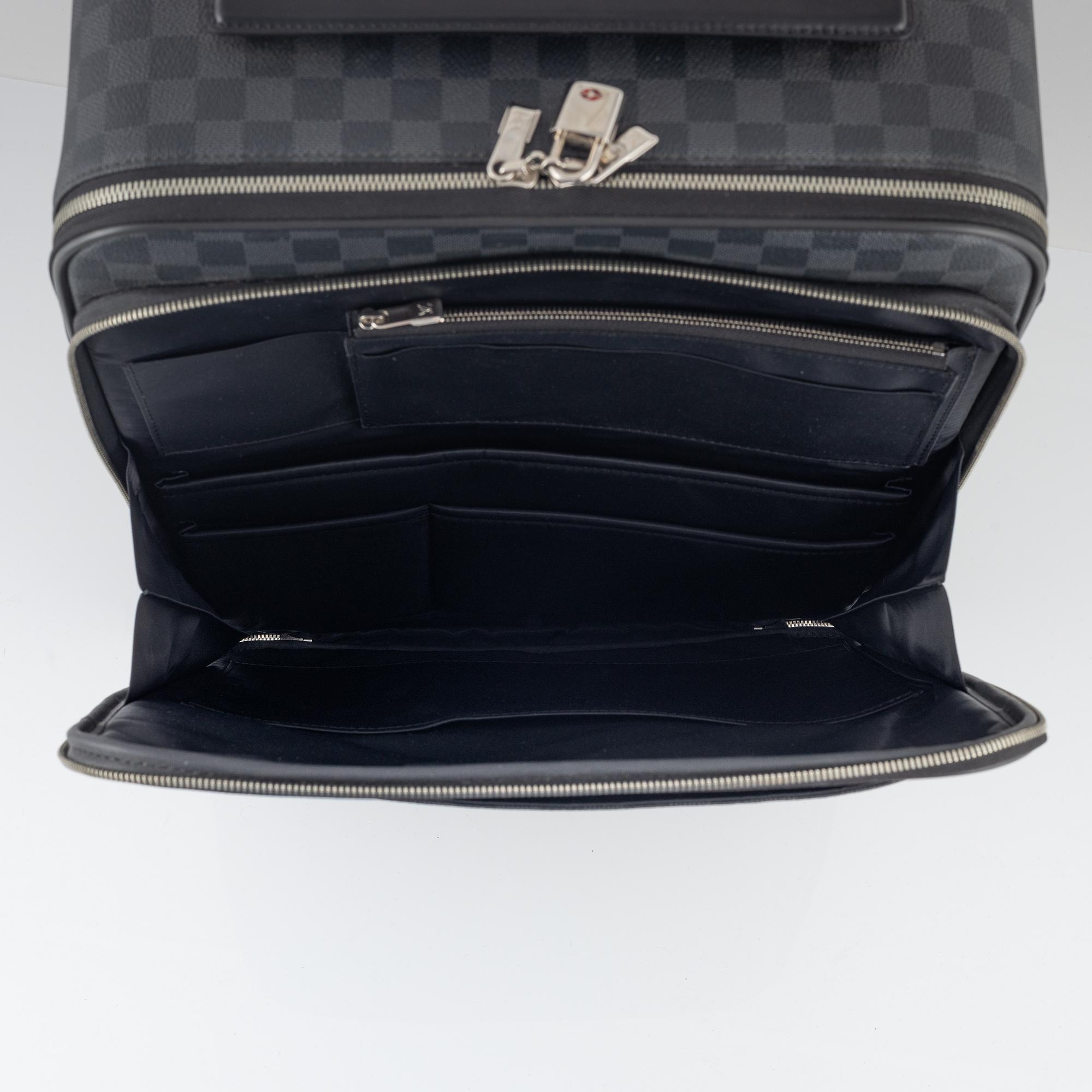 Louis Vuitton, a 'Pégase 50' travel bag.
