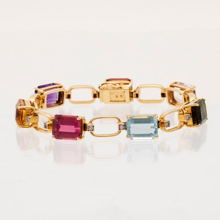 An 18K gold bracelet by H Stern set with round single cut diamonds and coloured gemstones.