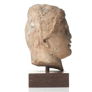 A marble head of a woman, probably Roman 100-200 AD.