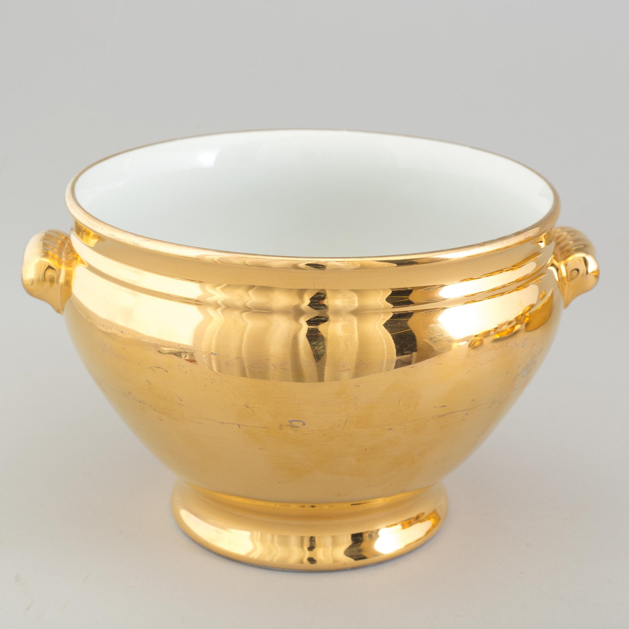 A mixed lot of thirteen pieces porcelain mostly Royal Worcester gold lustre, 20th century.