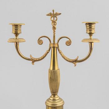 A pair of brass candelabra, first half/mid 19th century.