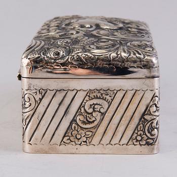 A silver cigar box, mark of A. & J. Zimmerman, Birmingham 1897.