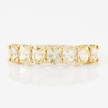 Ring, half eternity, 18K gold with yellow sapphires.