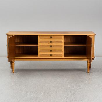 a gustavian style sideboard from the second half of the 20th century.