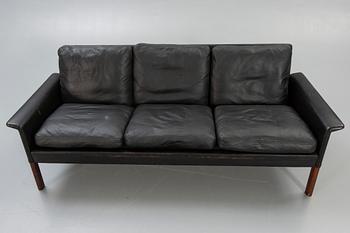 A 1960/70s leather sofa.