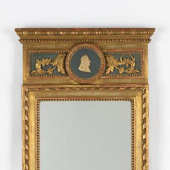 A late Gustavian giltwood mirror, late 18th century.