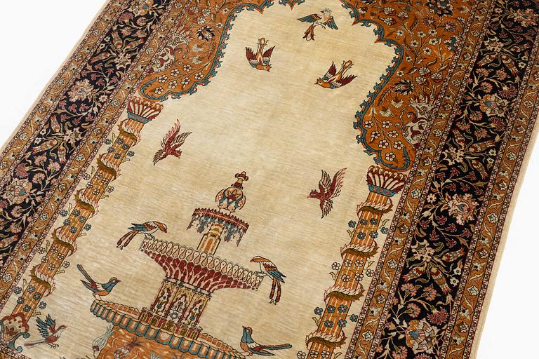 A semi-antique/old pictoral silk Hereke rug, West Anatolia, c. 152 x 103 cm.