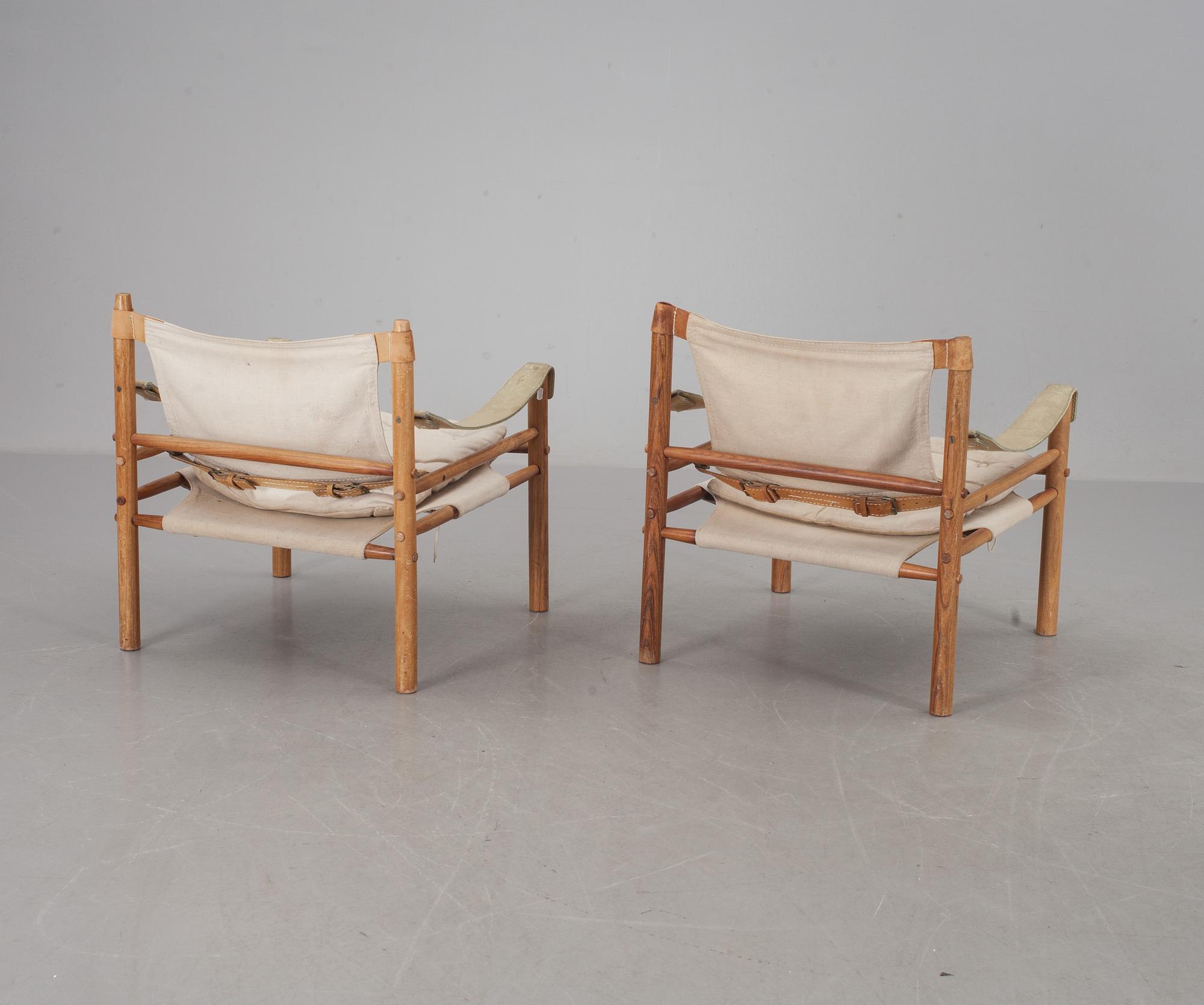 FÅTÖLJER, ett par. "Sirocco", Arne Norell, modellen formgiven 1964. CITES-intyg medföljer.