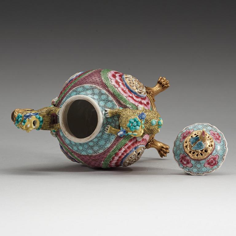 A gilt bronze mounted famille rose tea pot with cover, Qing dynasty, Yongzheng (1723-35).