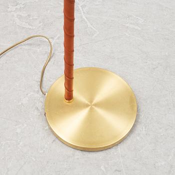 A brass floor lamp from EWÅ, second part of the 20th Century.