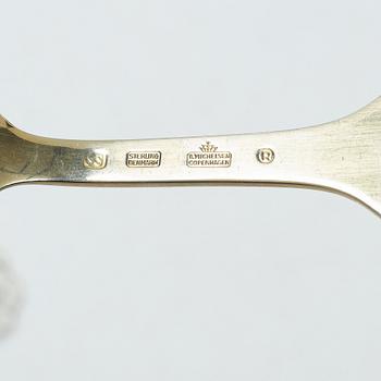 Anton Michelsen, Annual/Christmas flatware, 6 pieces, gilt sterling silver and enamel, Denmark, 1950s.