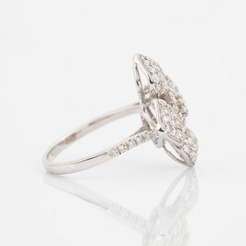 Brilliant cut diamond flower ring.