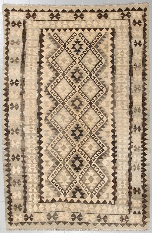 A kelim rug, 248 x 163 cm.