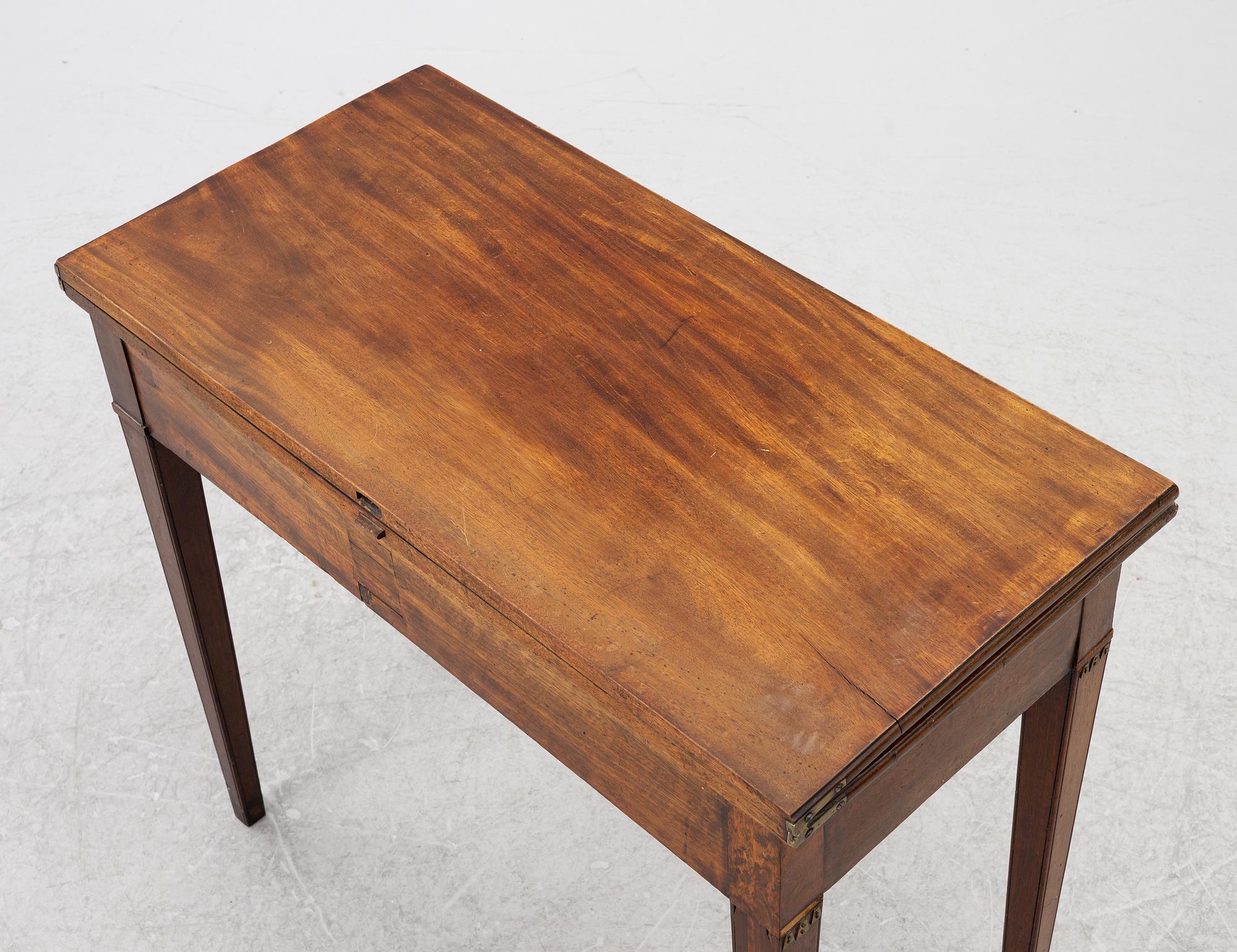 A late Gustavian mahogany games table, 18th century.