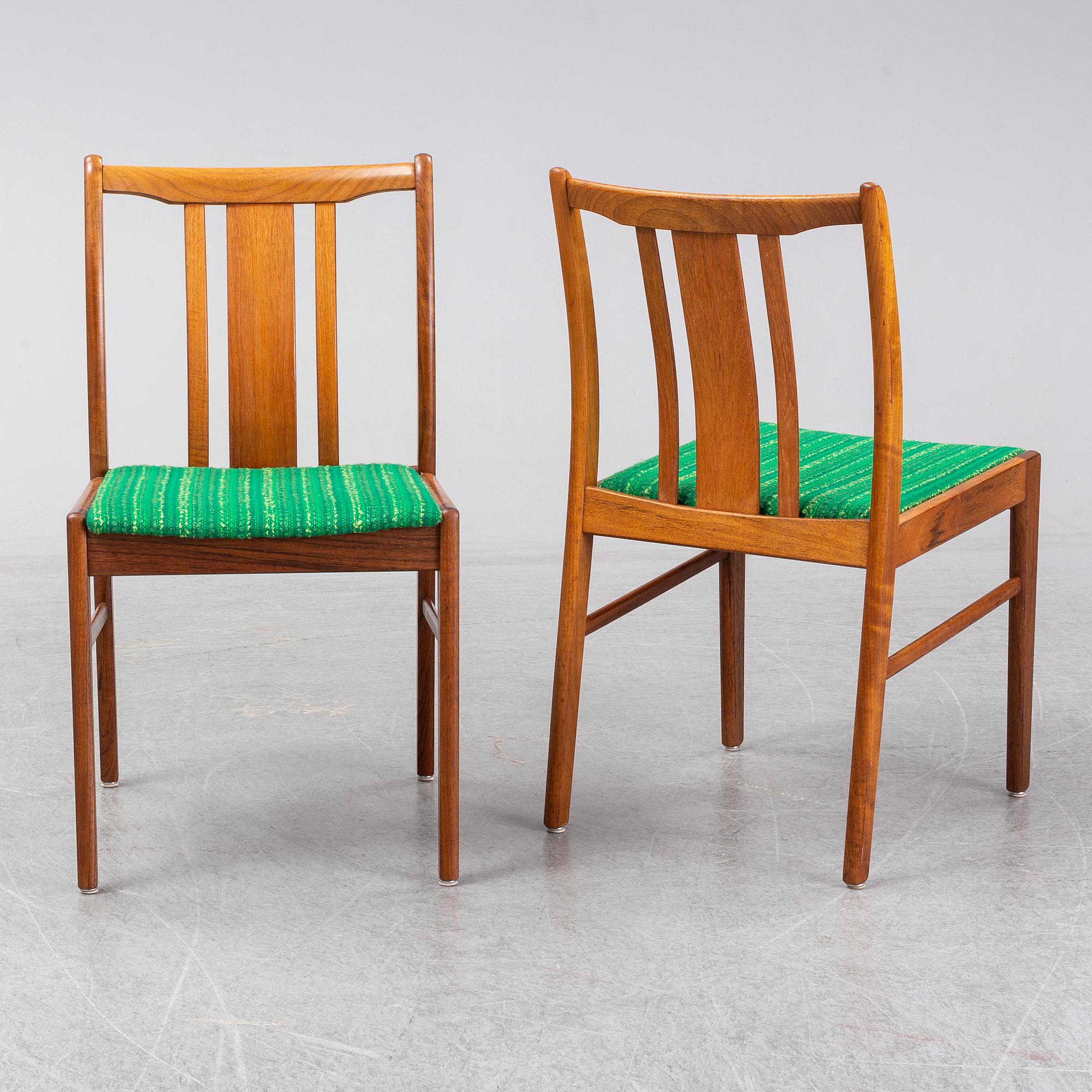 Four second half of the 20th century teak chairs.